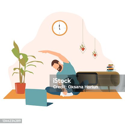 istock Man doing yoga at home 1344234289