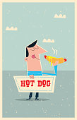 Man eating and announcing a hotdog