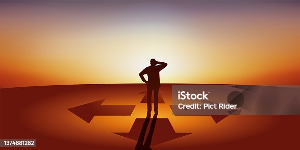 istock A man must make a decision by choosing between four orientations. 1374881282