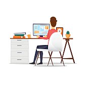 Man sitting at a desk and working on the computer back view, on an isolated background. Flat design vector illustration.