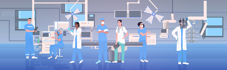 medical doctors team in uniform working together in operating room modern hospital clinic interior intensive therapy surgical procedures teamwork concept horizontal full length