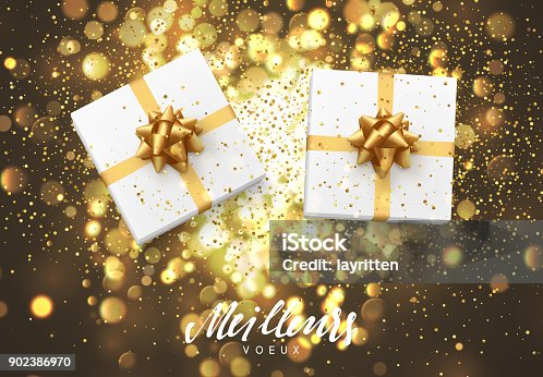 istock Meilleurs voeux Joyeux Noel. Christmas background with gift box and golden lights bokeh. 902386970