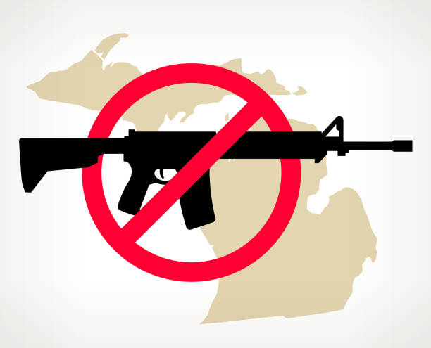 Michigan No Gun Violence Vector Poster Michigan No Gun Violence Vector Poster. The machine gun is placed in a red forbidden circle over the outlines of the map. The gun is black in color and the map is beige. It is on a light background with a slight gradient. The image represents a growing campaign to end gun violence and to ban semi-automatic and automatic weapons. michigan shooting stock illustrations