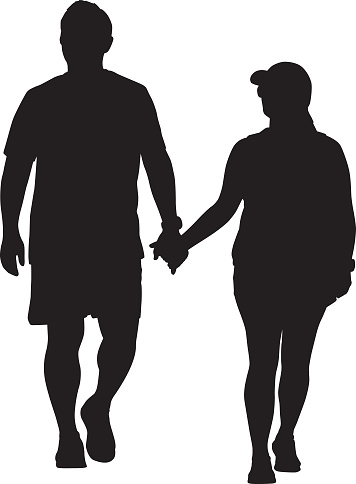 Middle Aged Couple Walking Hand In Hand