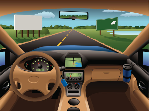 A view over the dashboard and out the windshield of a generic later model vehicle. Background can be changed out easily since it is on its own layer. Billboards may be removed or have messages added if so desired.