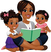 A woman (mom, family member, nanny, teacher, babysitter, caregiver, etc) reading to two little girls.