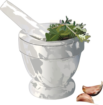 Mortar and Pestle with herbs, garlic