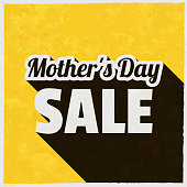 istock Mother's Day Sale. Icon with long shadow on textured yellow background 1395305803