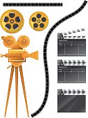 Movie and Film Industry Elements containing gold camera and two film reels plus film strip and 3 director cut scene boards.