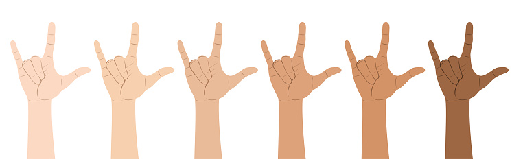 Multi-Ethnic hands show LOVE in American Sign Language