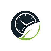 istock Nature time vector logo design. Vector clock and leaf logo combination. 1399715315