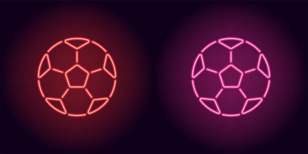 Neon football ball in red and pink color Neon football ball in red and pink color. Vector illustration of soccer ball consisting of outlines, with backlight on the dark background pink soccer balls stock illustrations