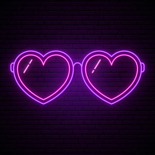 Neon glasses in the form of hearts. Glowing glasses icon on dark  brick background. Vector illustration. Neon glasses in the form of hearts. Glowing glasses icon on dark  brick background. Vector illustration. background of the glow in the dark hearts stock illustrations