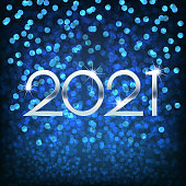 New year 2021 eve, background with blue bokeh and numbers, festive abstraction, wallpaper or greeting card.