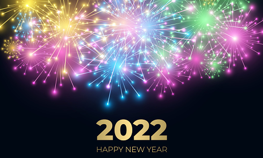 New year 2022 festive background with fireworks and sparkle celebration lights.