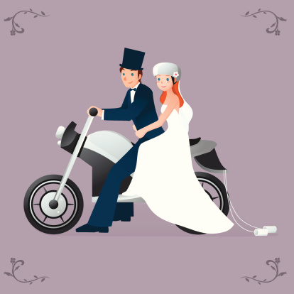 Newlywed Biker bride and groom on Motorcycle