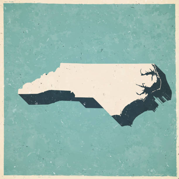 North Carolina map in retro vintage style - Old textured paper Map of North Carolina in a trendy vintage style. Beautiful retro illustration with old textured paper and a black long shadow (colors used: blue, green, beige and black). Vector Illustration (EPS10, well layered and grouped). Easy to edit, manipulate, resize or colorize. north carolina us state stock illustrations