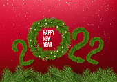 Numbers 2022 of christmas tree branches isolated on red. Christmas Tree Wreath Decorated with Christmas balls and Candy Canes instead zero. Happy New Year Greating Card. Vector illustration