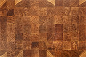 istock Oak wood butcher end grain chopping block board 1285487801