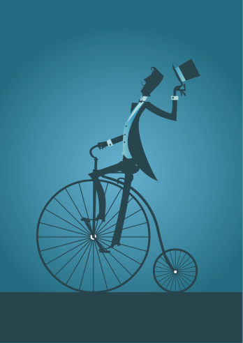 Old bicycle with Victorian Man silhouette
