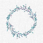 Delicate wreath filled with olive branches and leaves. Spotted pattern background.