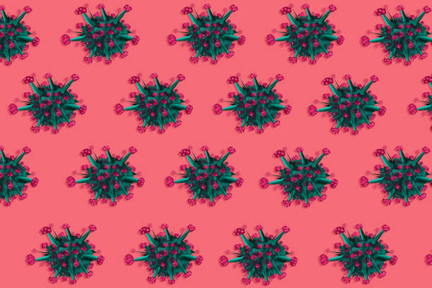 Omicron pattern Small Omicron spikes in a seamless pattern on pink background omicron stock illustrations
