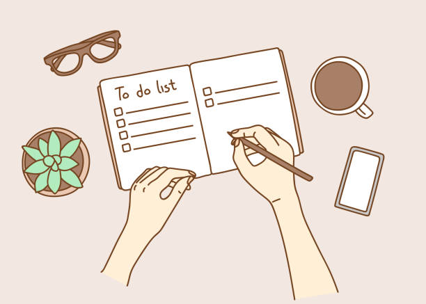 Opened personal organizer with a to do list. Top view of women hands writing goal to do list Opened personal organizer with a to do list. Top view of women hands writing goal to do list to do list stock illustrations