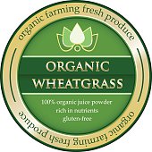 Organic farming wheatgrass juice powder rich in nutrients on a gold label.