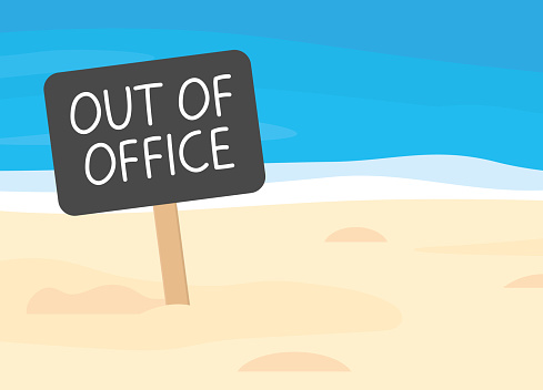out of office written on sign board on sandy beach, Paid Time Off, vacation concept