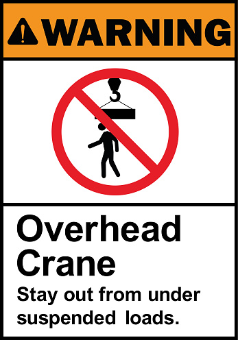 Overhead crane stay out from under suspended loads warning sign.