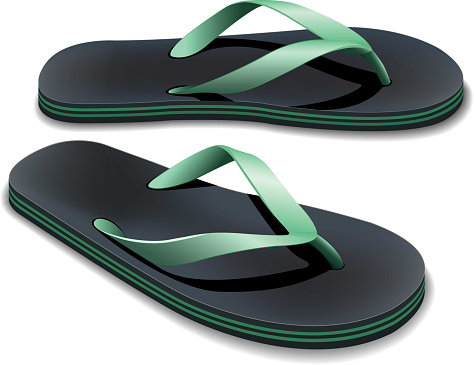 A pair of black and green flip flops