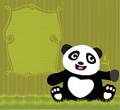 Panda Bear sitting and waiting while holding a bamboo twig.