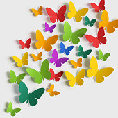 istock Paper butterfly multi-colored on white background. 1301828665