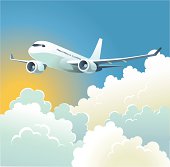 istock Pasenger Plane Over the Clouds 503152697