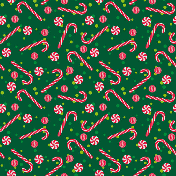 Peppermint Candy Seamless Pattern Candy canes and peppermints on dark green background candy canes stock illustrations