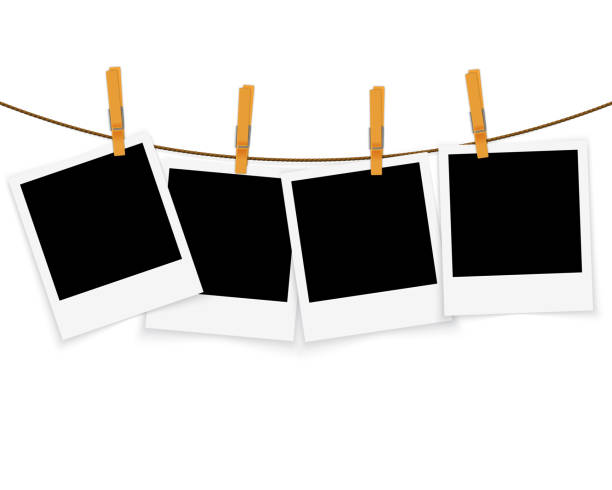 Photo frames on rope with clothespins vector vector art illustration