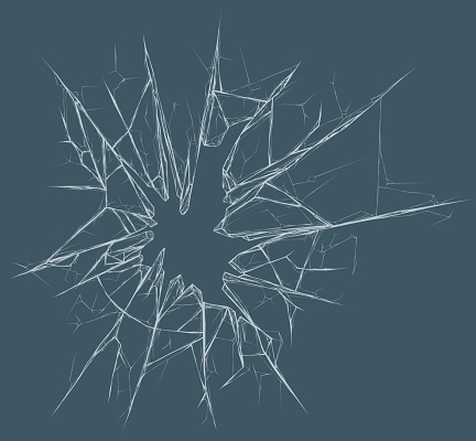 Picture of a broken glass pane on a gray background