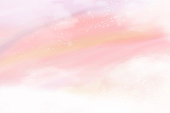 istock Pink watercolor cotton cloud background. Pastel fantasy sky backdrop template for wedding invitation, greeting card, banner or flyer. Vector illustration of fluffy candy clouds 1304766555
