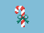 istock Pixel art candy cane Christmas illustration. 1347834076