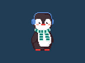Pixel art full body penguin in a scarf and warm ears. Vector 8 bit style retro illustration of winter animal. Isolated winter penguin character for video game, sticker or decoration.