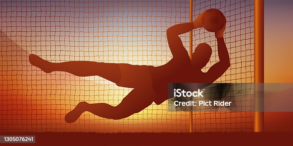 istock Play action during a football match, with a goalkeeper stopping a shot on goal from an opposing player. 1305076241