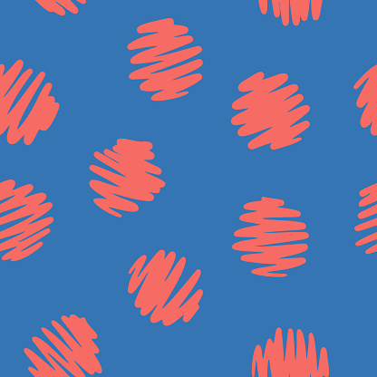 Polka dot seamless pattern. Red decorative hand drawn circles isolated on blue. Simple graphic background.