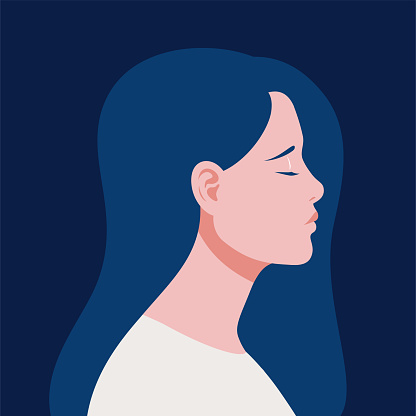 Portrait of a sad woman in profile