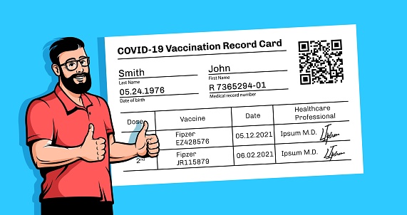 Positive bearded man with a vaccination certificate