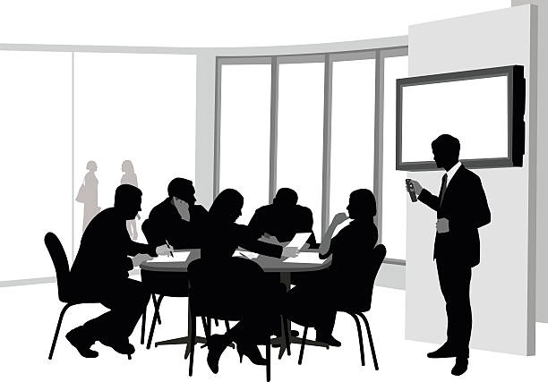 Power Point Presentation A vector silhouette illustration of a presentation to board room meeting amongst business men and women sitting a table with documents.  A young man stands in front of a monitor holding a remote control. writing activity silhouettes stock illustrations