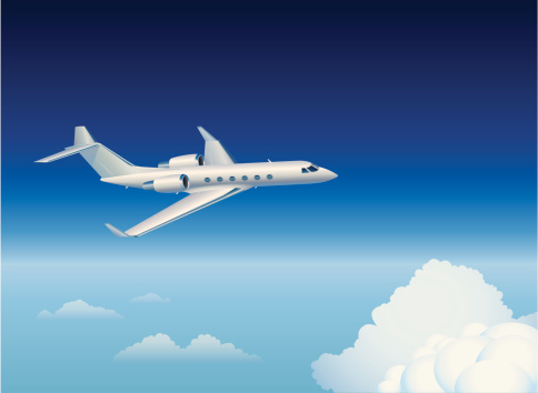 Private jet flying at high altitude