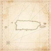 Map of Puerto Rico in vintage style. Beautiful illustration of antique map on an old textured paper of sepia color. Old realistic parchment with a compass rose, lines indicating the different directions (North, South, East, West) and a frame used as scale of measurement.Vector Illustration (EPS10, well layered and grouped). Easy to edit, manipulate, resize or colorize. Please do not hesitate to contact me if you have any questions, or need to customise the illustration. http://www.istockphoto.com/portfolio/bgblue
