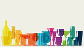 Cocktail glasses and pitchers with rainbow colours