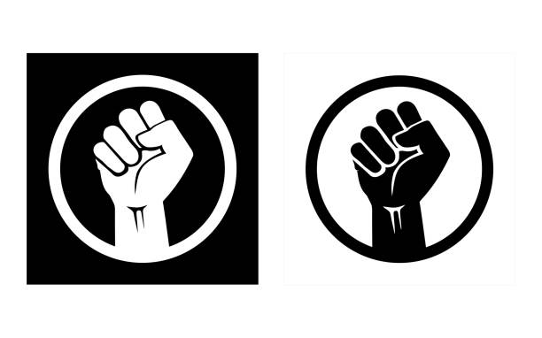 Raised hand with clenched fist in a circle. Set of icons depicting solidarity, anti-racism, protest and strength. Black raised fist protest symbol icons. Clenched fist with circle isolated on black and white backgrounds. Justice, anti-racism, strength and solidarity icon set. anti racism stock illustrations