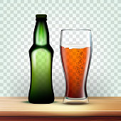 istock Realistic Bottle And Goblet With Dark Beer Vector 1145191166